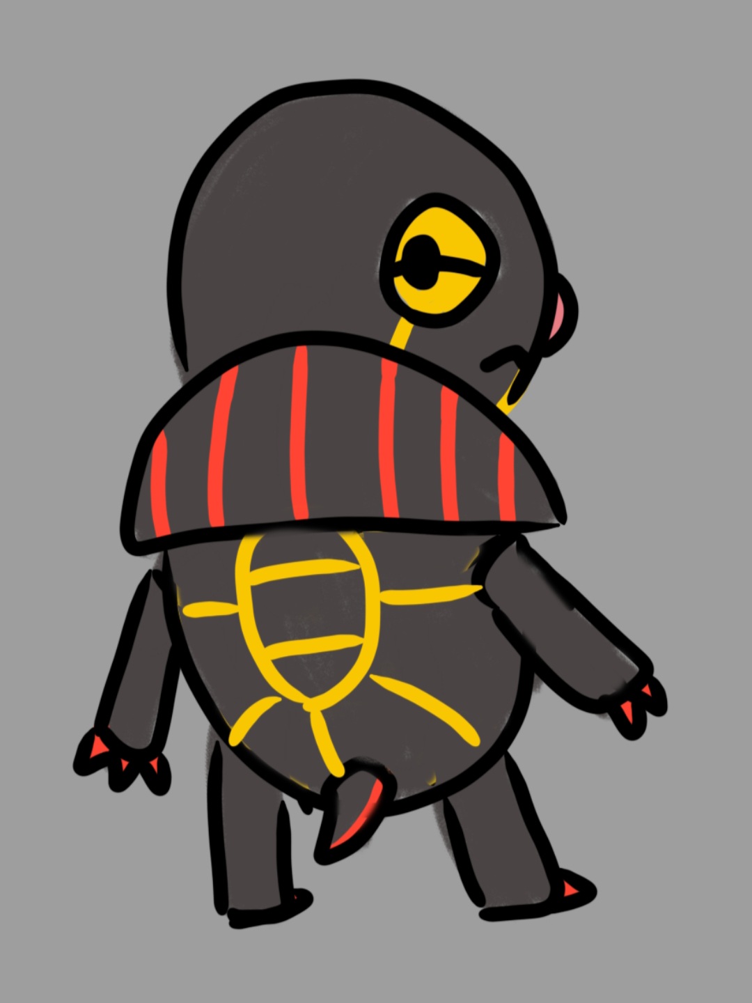 A small black, red, and yellow turtle, turned to display the gold patterns on its shell.